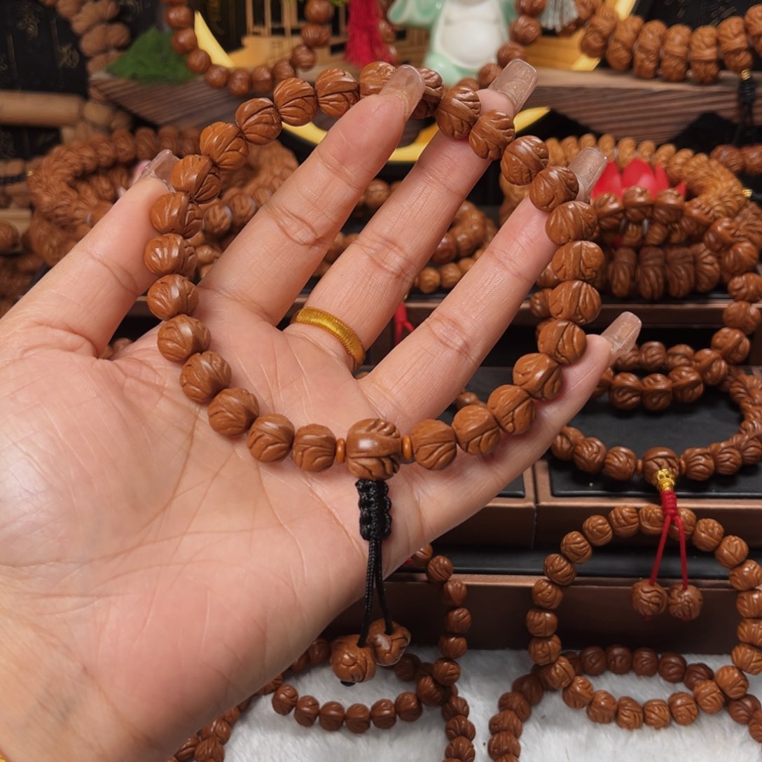 桃核手串D****s12顶级玉龙脊手持