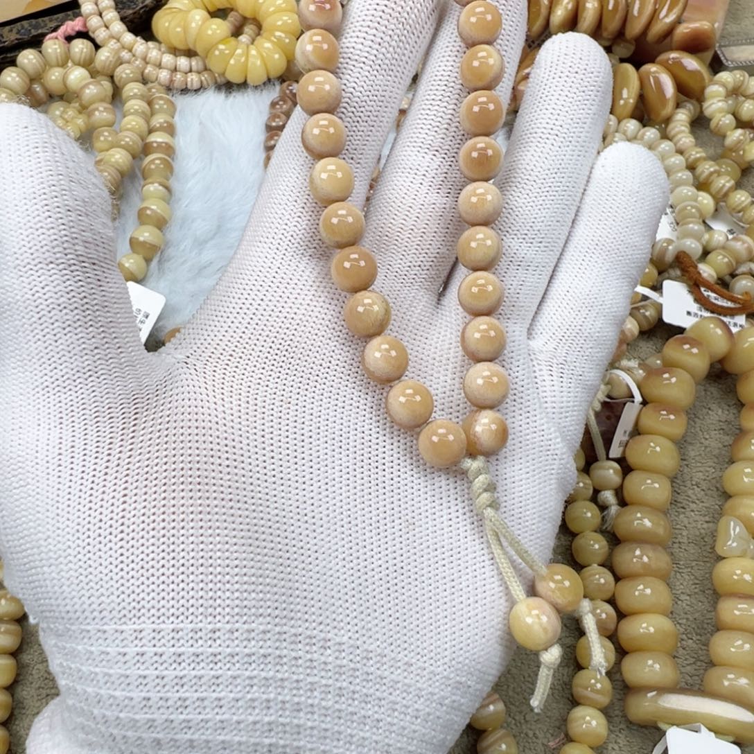 驼骨眼球卡九圆珠手持