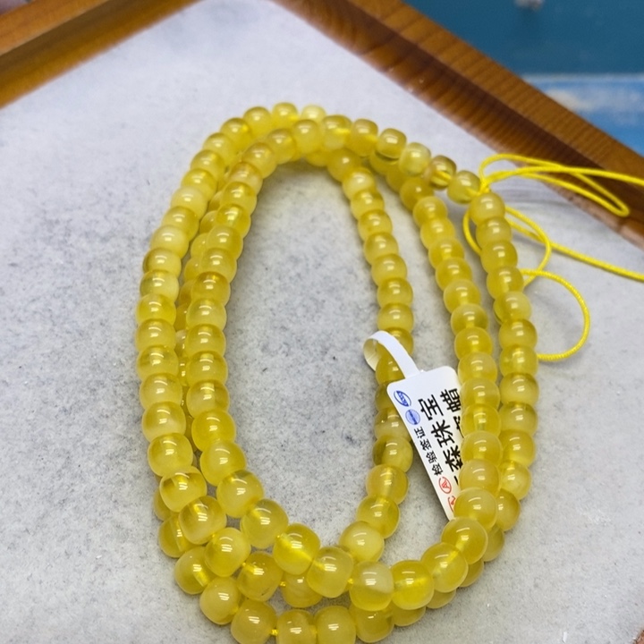 蜜蜡裸石未镶嵌串