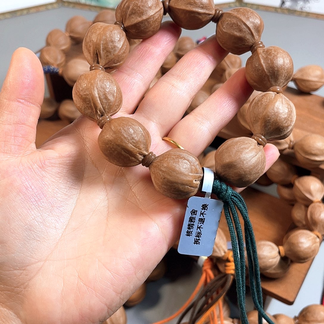 与***行手串/手链橄榄核21.5/24梅林铁核