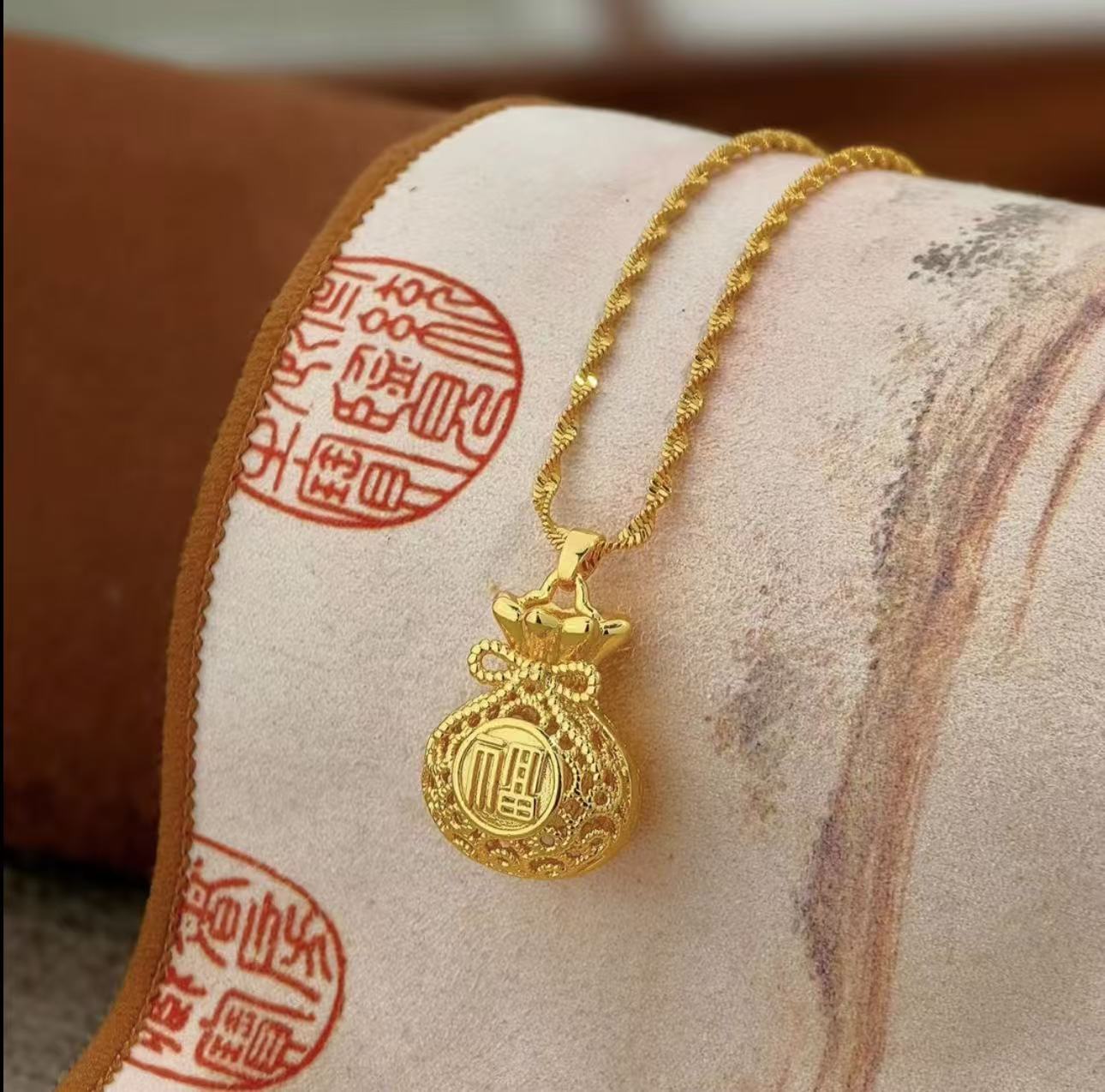 花丝镂空福袋项链吊坠女款气质时尚百搭女士金色精美