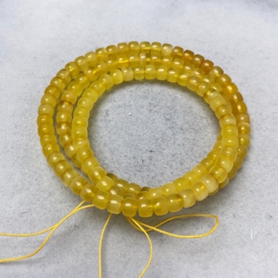 蜜蜡裸石未镶嵌串