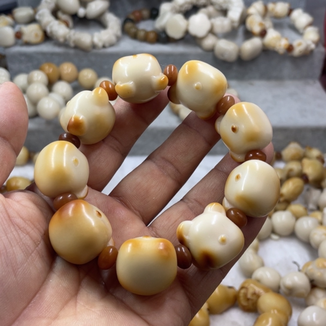 吊坠菩提根/象牙果全品象牙果烤熊头手串卡22