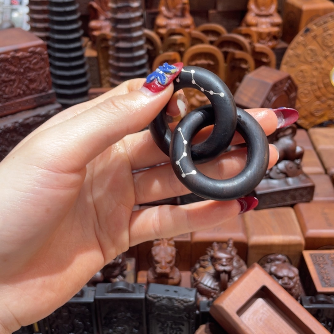 易***霖木枣木玉化2.5六七星镶银乾坤圈