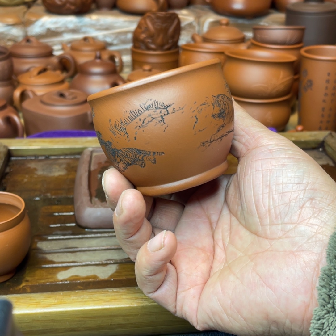 紫砂茶壶放漏主人杯