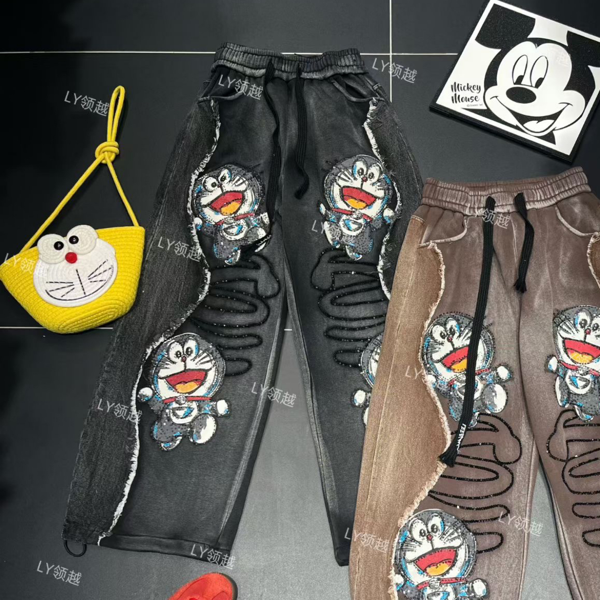 秋冬新款牛仔拼接叮当猫加绒加厚宽松显瘦显高宽松百搭韩版卫裤