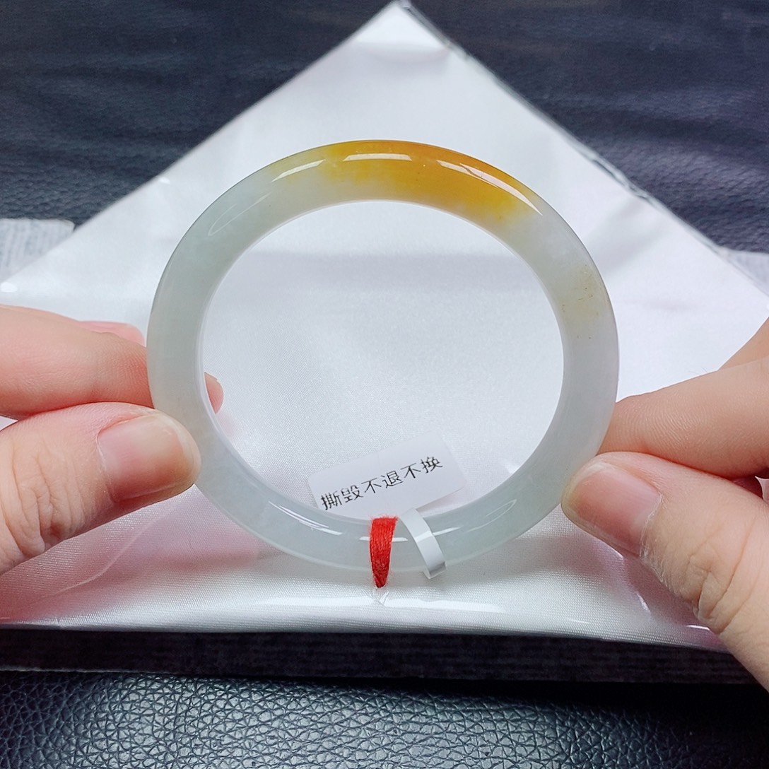 翡翠手镯未镶嵌54圆条黄翡 沙眼皮壳瑕疵漏