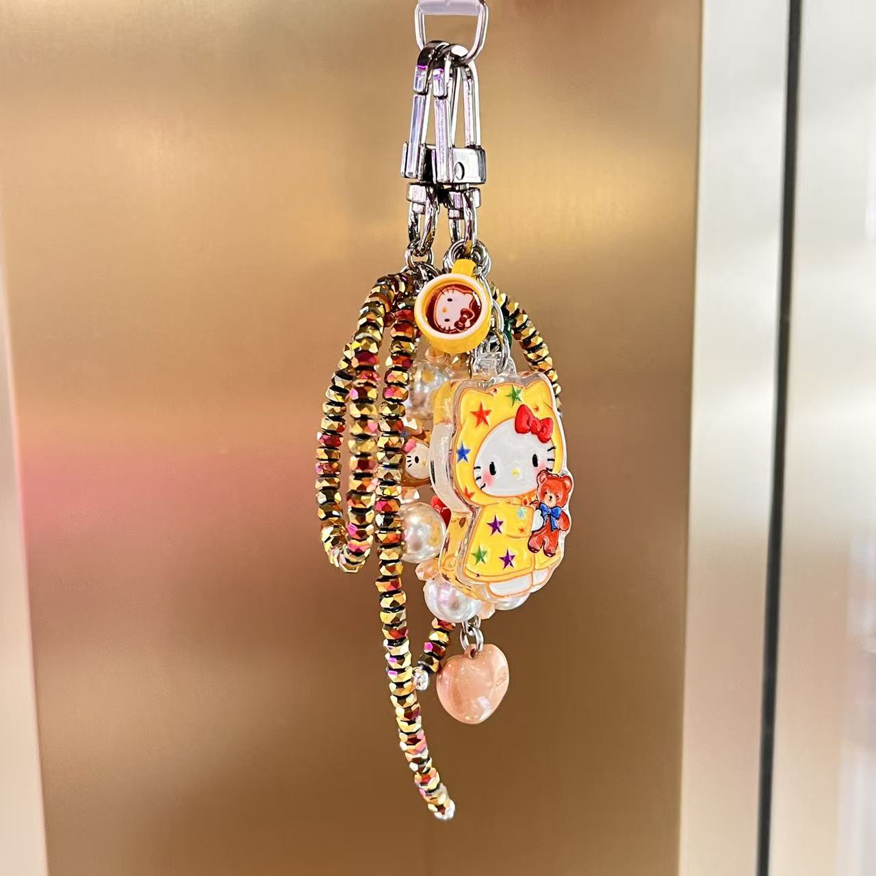 宁宁家原创卡通雨衣Kitty手机链 现货沈阳发