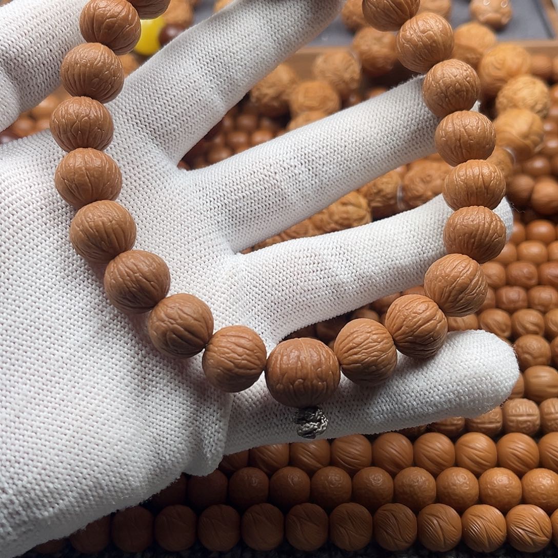 吊坠猴头核桃原皮凤羽