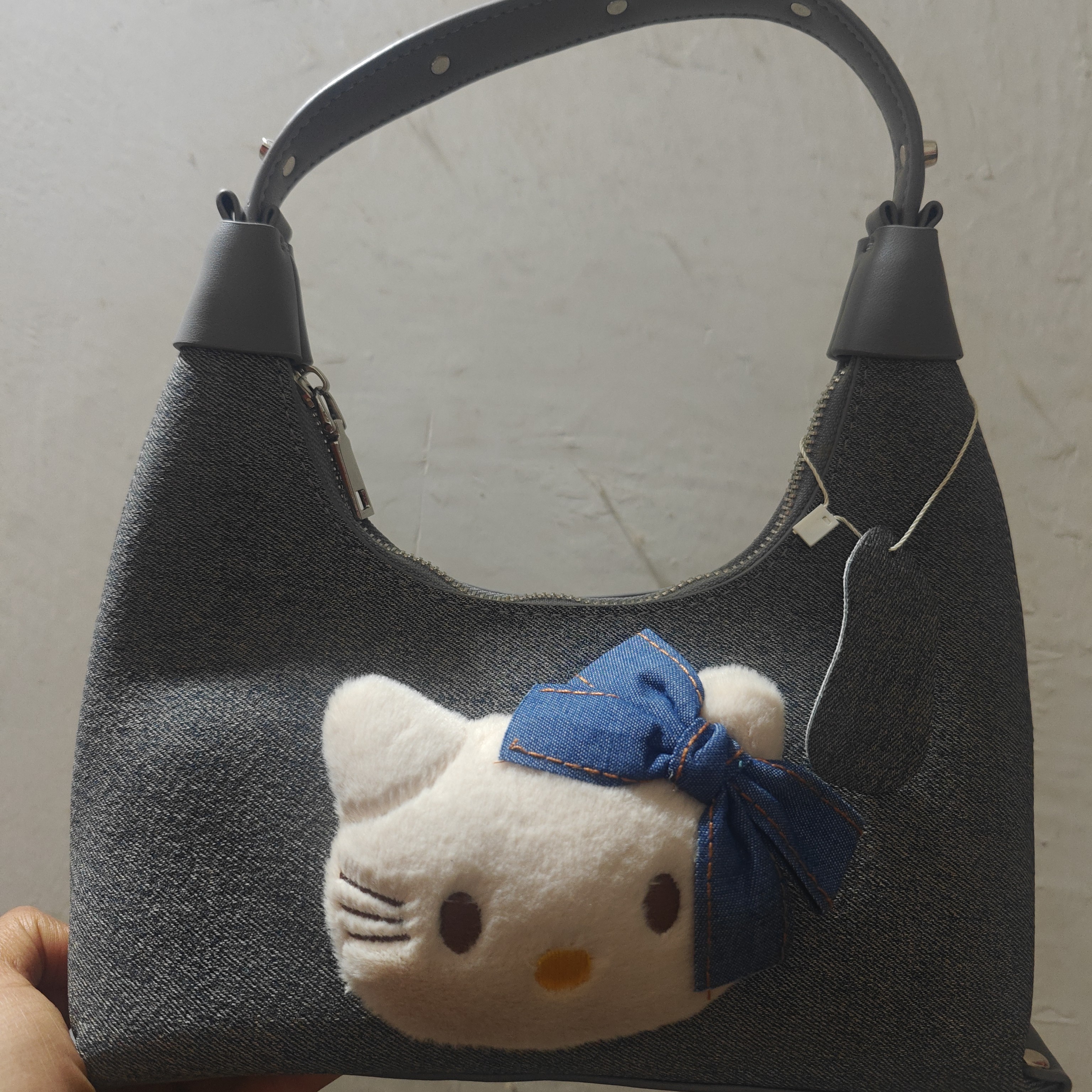 可爱牛仔kitty铆钉斜挎手提小包包