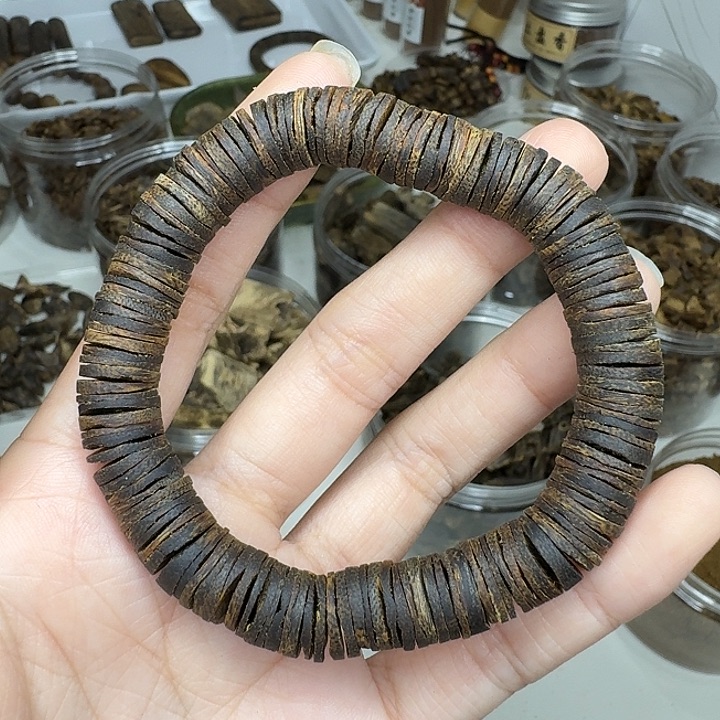 认***喵沉水乌身圆叶片片珠15克