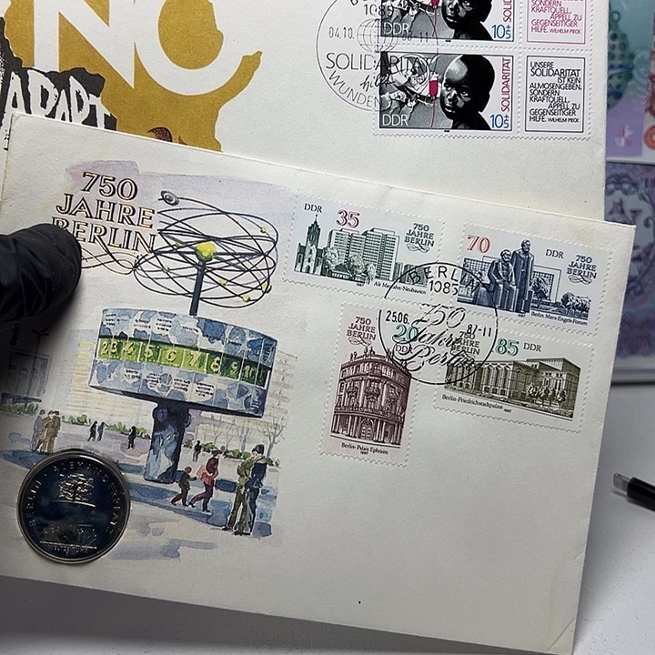 热***统纸币德国硬币俩个如图