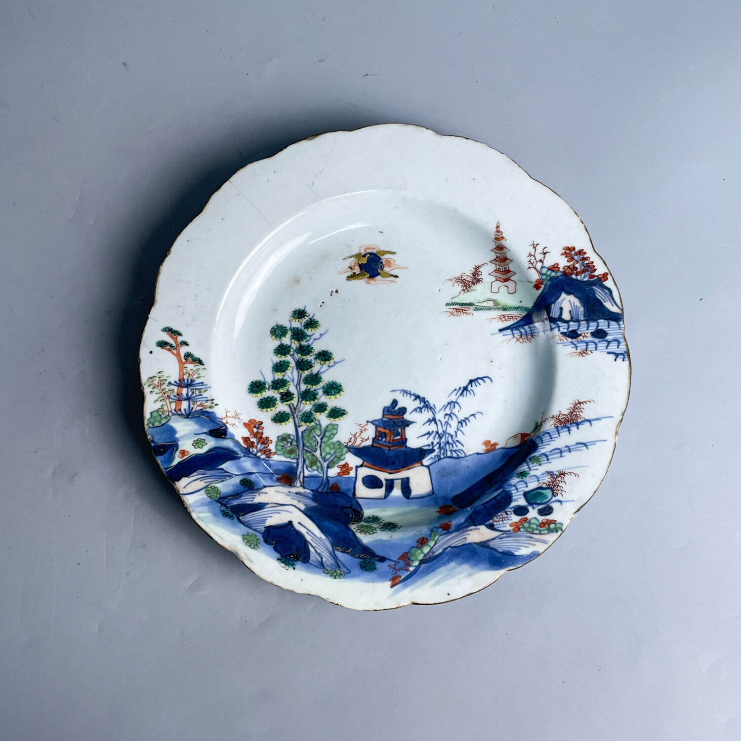 清乾隆粉彩山水纹盘（磕冲）-M25H6002036