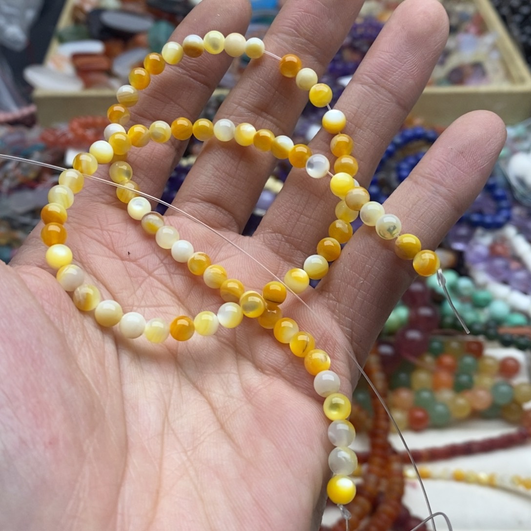 玛瑙/玉髓未镶嵌珠宝半成品一条纯天然5mm金蝶贝圆珠