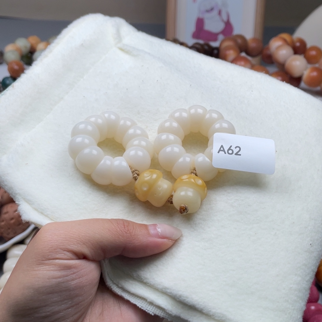 吊坠菩提根/象牙果A62蒜瓣手捻13+mm一串通货随机