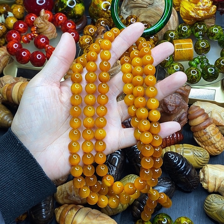 ****G松木琥珀木文玩把件