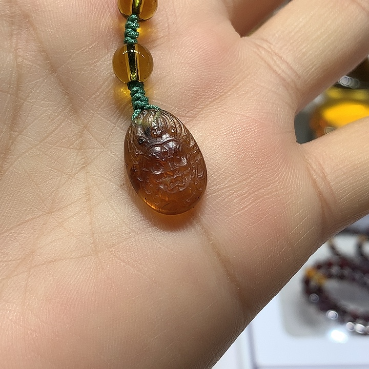 裸石琥珀未镶嵌黑财神手机挂