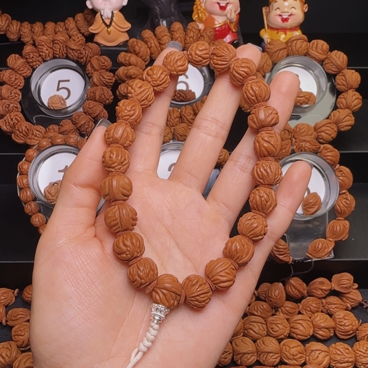 幸***己桃核手串金豆手串