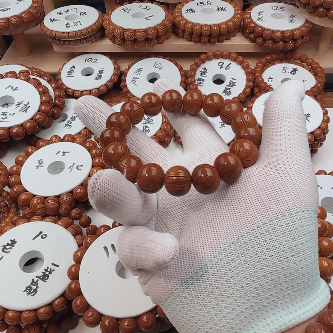 桃核手串杨****肉桃核手串