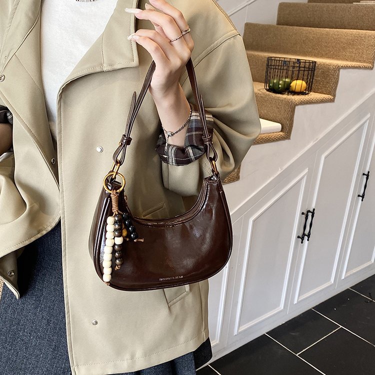 韩版ins小众设计饺子包2025新款女式简约休闲气质单肩包斜挎包