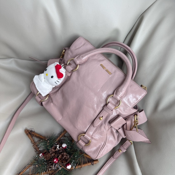 95新 MIU MIU/缪缪 粉金蝴蝶结小号机车油蜡皮单肩包