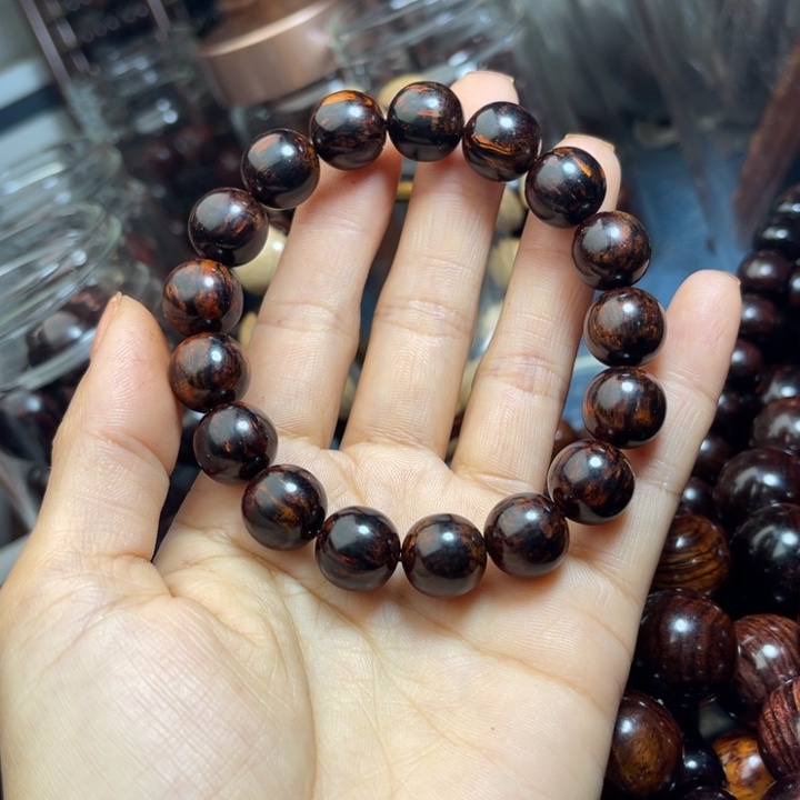 流***天端景台花梨木类海南红降1.2黑金手串