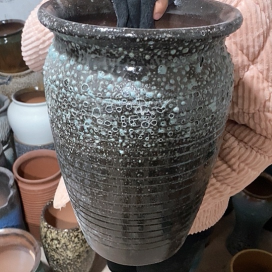 紫砂花盆口25高36，气泡款，瑕疵