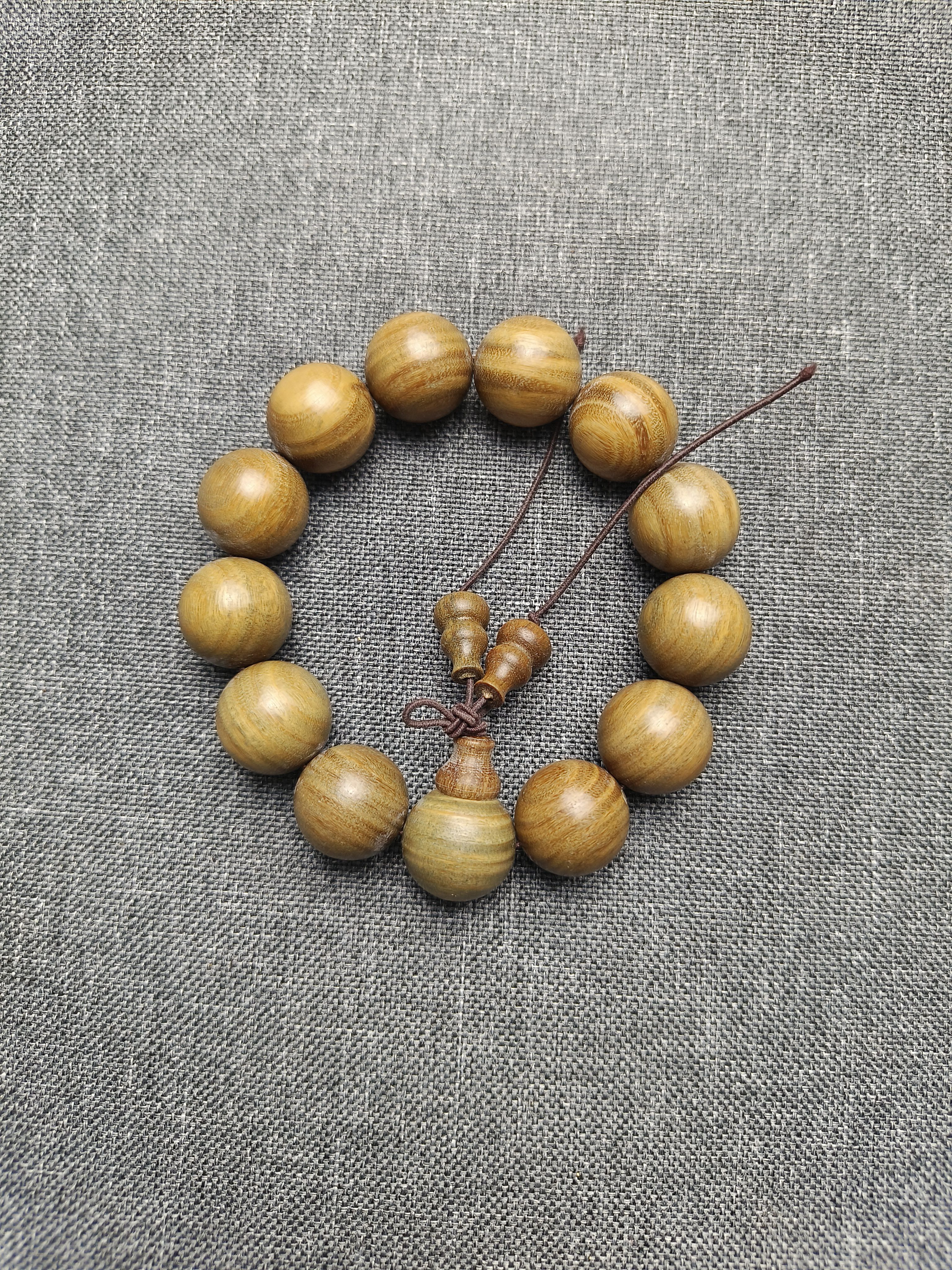 阿根廷绿檀木质首串1.8*13颗