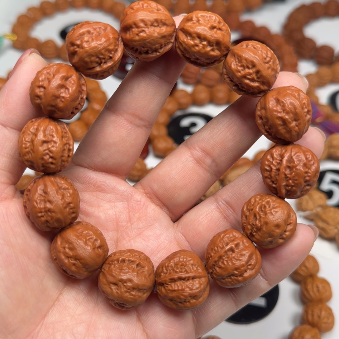 文玩核桃吊坠筷子筋