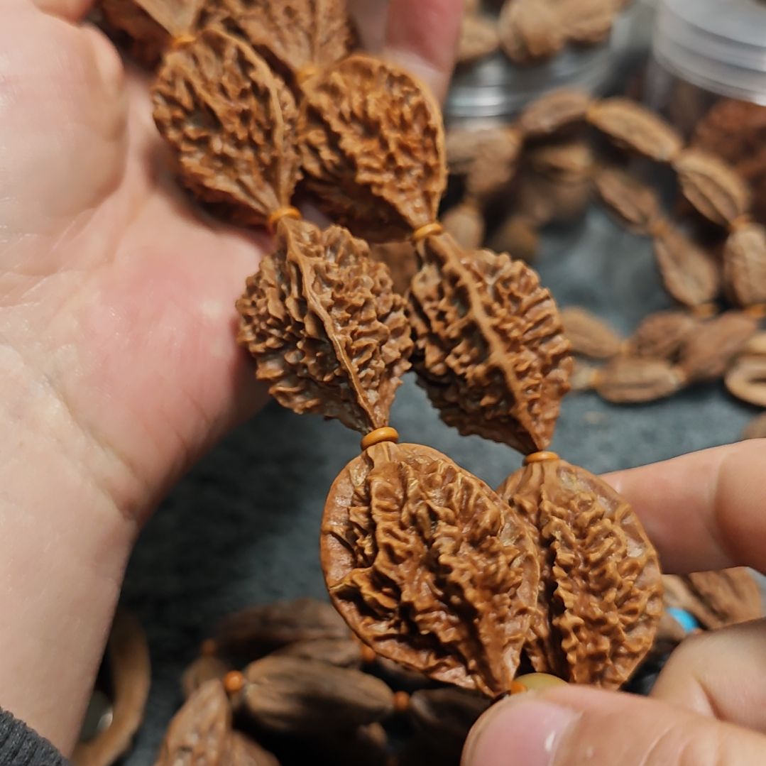 文玩核桃把件断齿龙骨手持