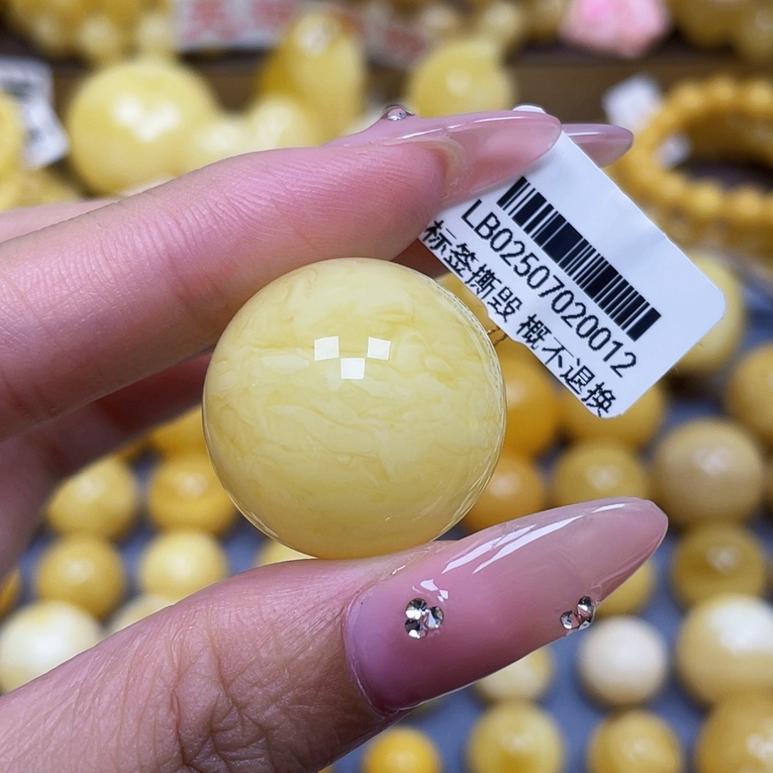 蜜蜡未镶嵌裸石24.4mm微瑕