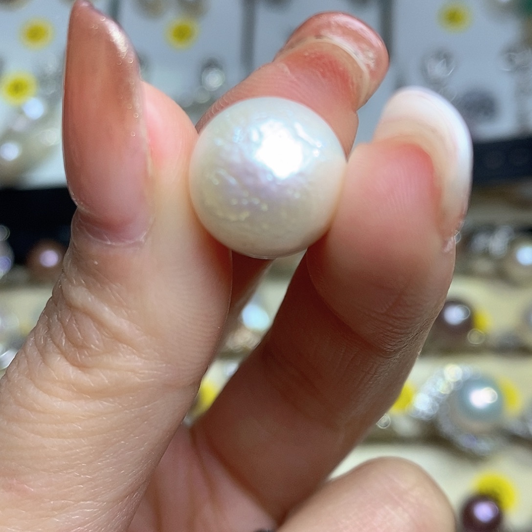 紫****未镶嵌珠宝奇石淡水珍珠