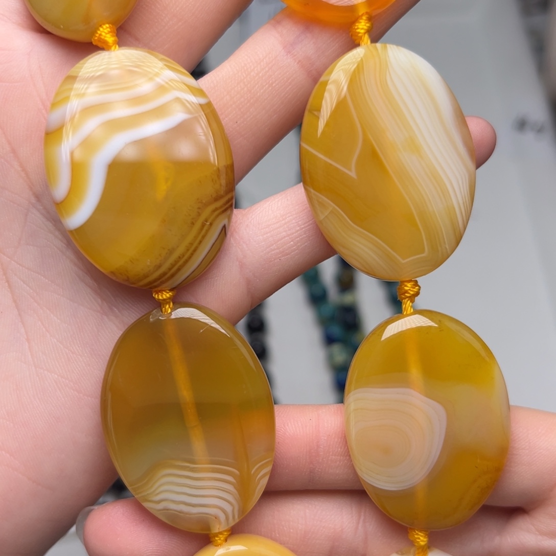 玛瑙/玉髓合金珠宝半成品K250。38*29mm天然缠丝玛瑙片片一条