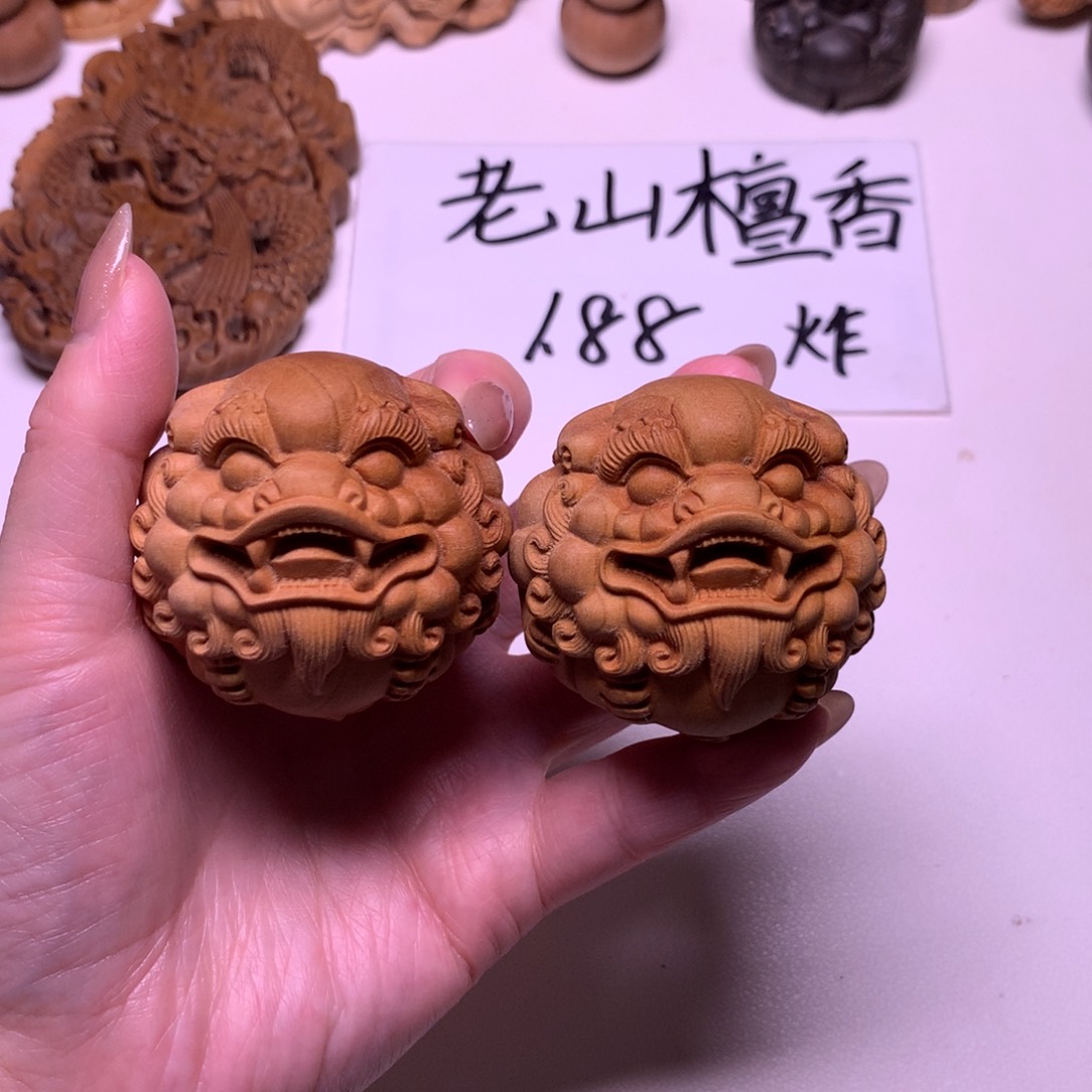 檀香木把件5.0貔貅手球