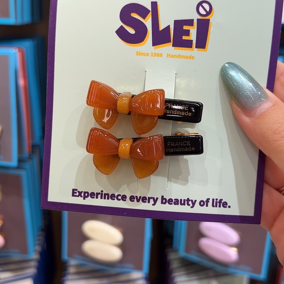 非金属皮质焦糖色蝴蝶结鸭夹