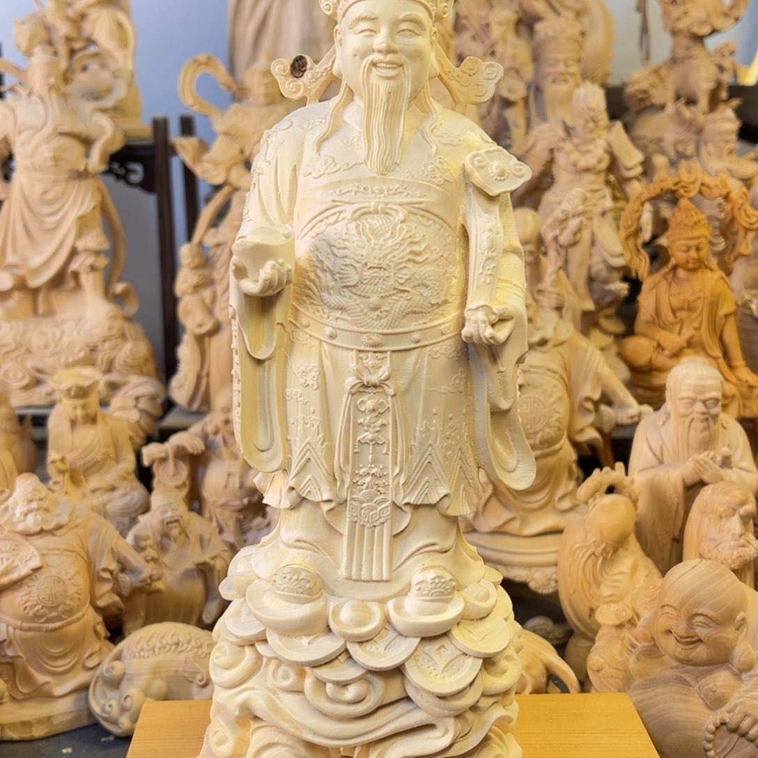 和***贵木大叶黄杨木20高财神摆件
