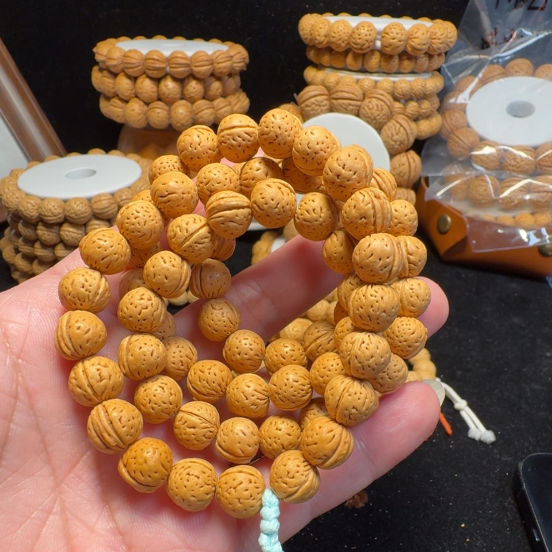 桃核手串金豆大半挂