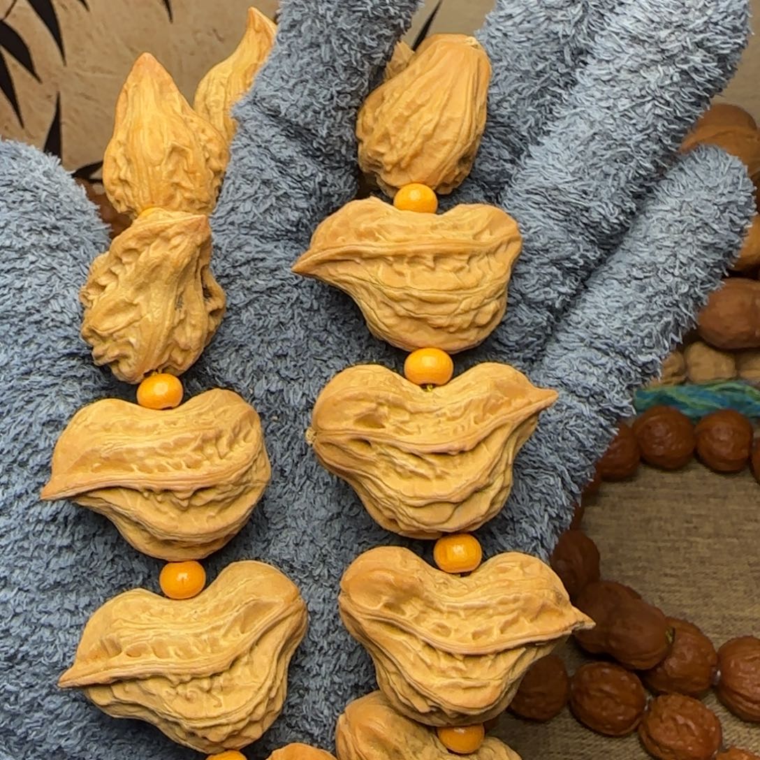 呲***溜吊坠文玩核桃小鸟手持13颗