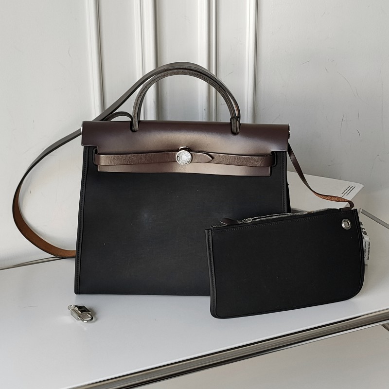 95新 Hermes/爱马仕 Azul-黑色帆布Herbag31拼皮斜挎包51633