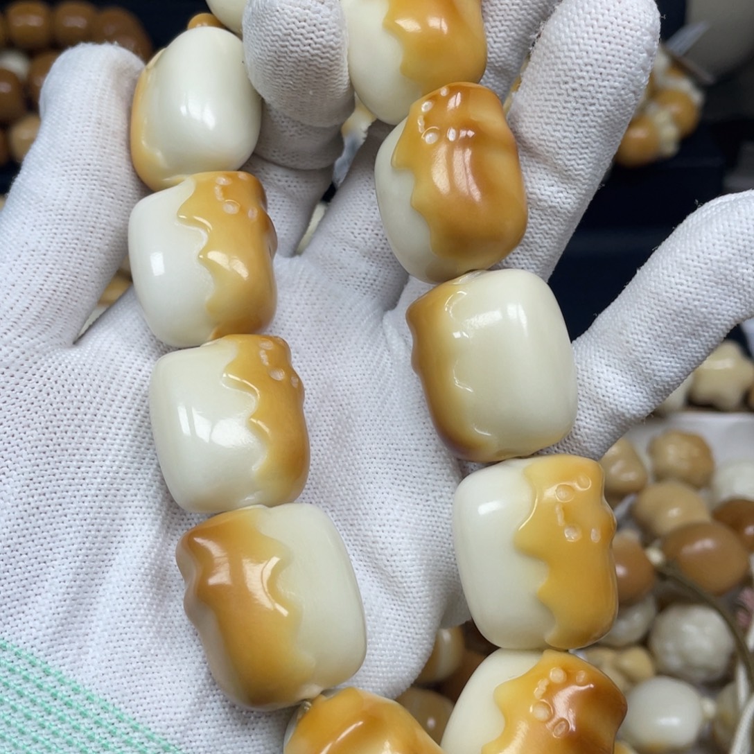 墨***o菩提根/象牙果手串104蛋糕猫微瑕