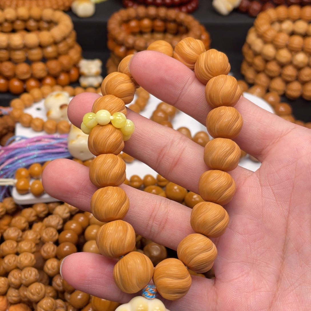 戚***齊吊坠猴头核桃猴头核桃全品卷卷酥