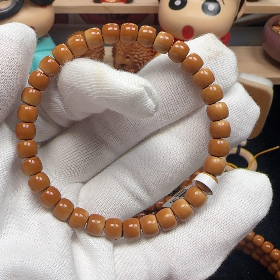 橄榄核手串老挝单圈极限弧微色差7.0mm