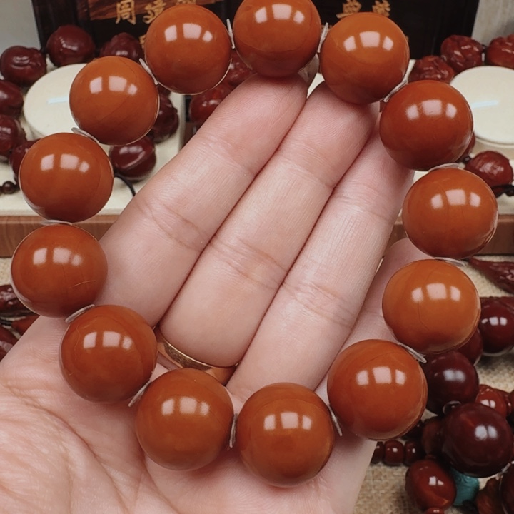 阿****?正圆光珠橄榄核88