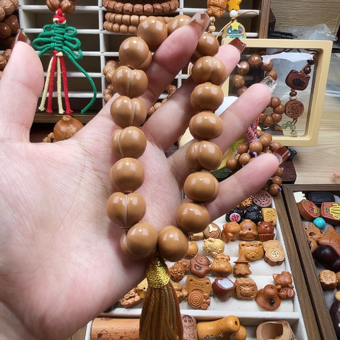 迷***人吊坠猴头核桃屁桃手持