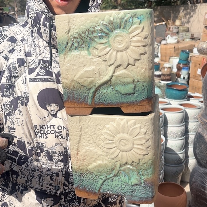 红陶口不正两个口径19高度19