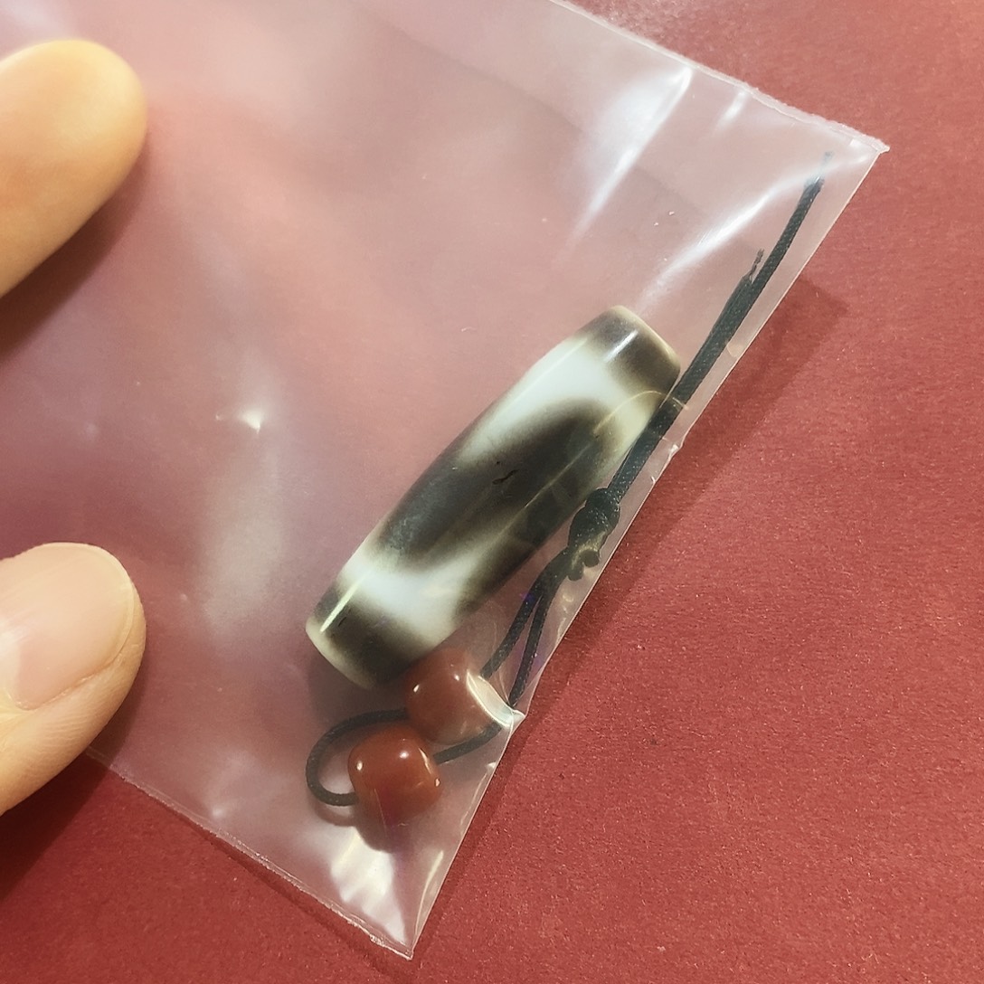 卿***至玛瑙/玉髓（覆膜）未镶嵌颈饰咖色牙牙