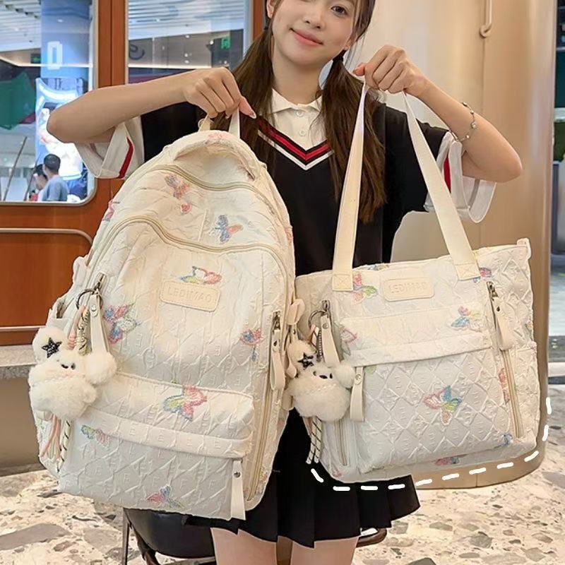 新款韩系书包女初中女生小学生高颜值大容量高中大学生蝴蝶背包女