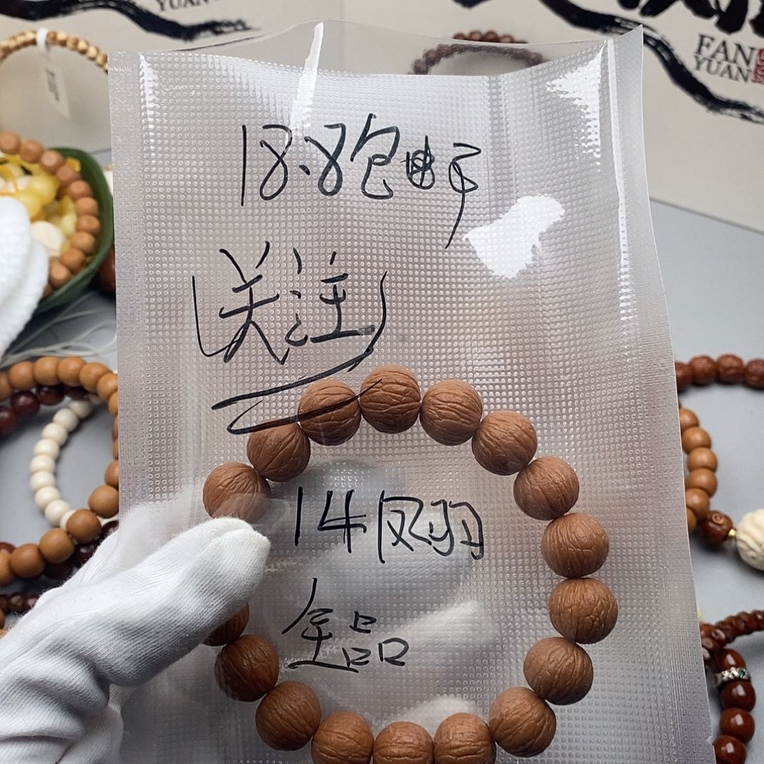 吊坠猴头核桃全品凤羽手串