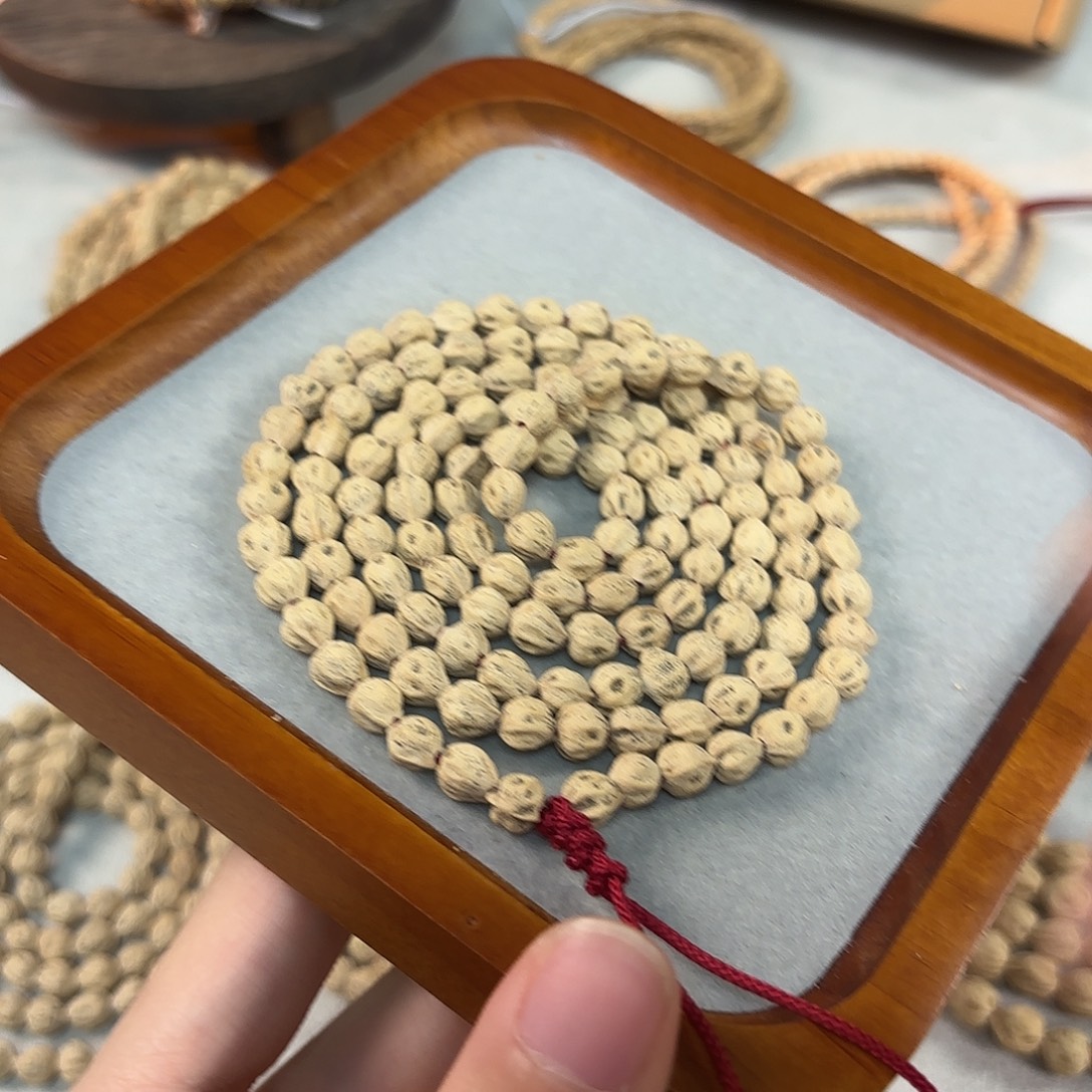 迎***竿柏香籽/百香籽吊坠