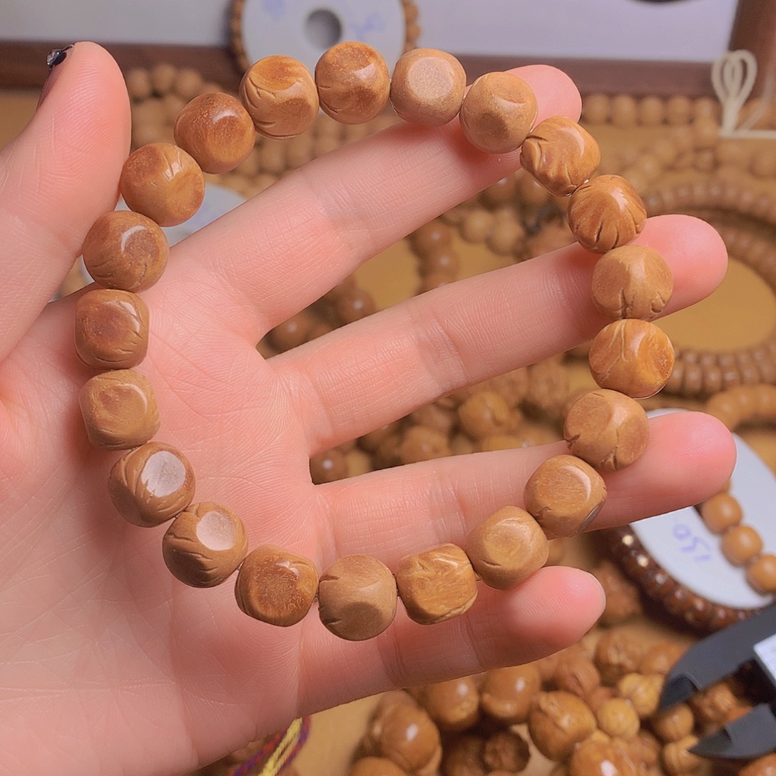 我***谁龙脊菩提吊坠龙纹六方桃核手串